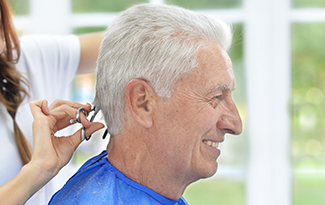 resident getting a haircut