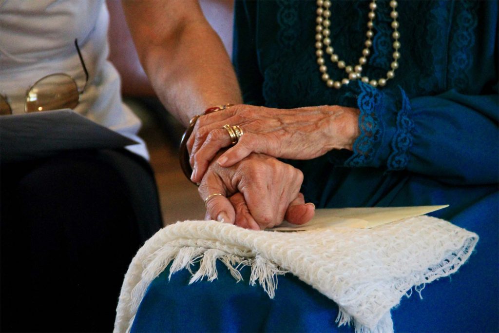 residents holding hands
