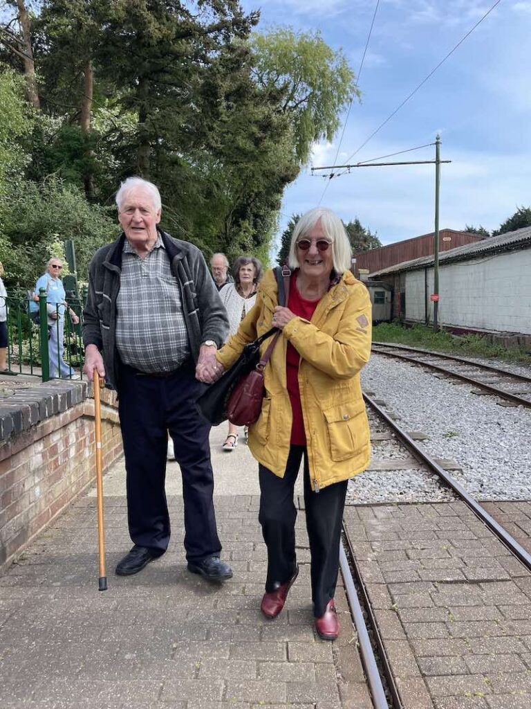 residents walking to tram together