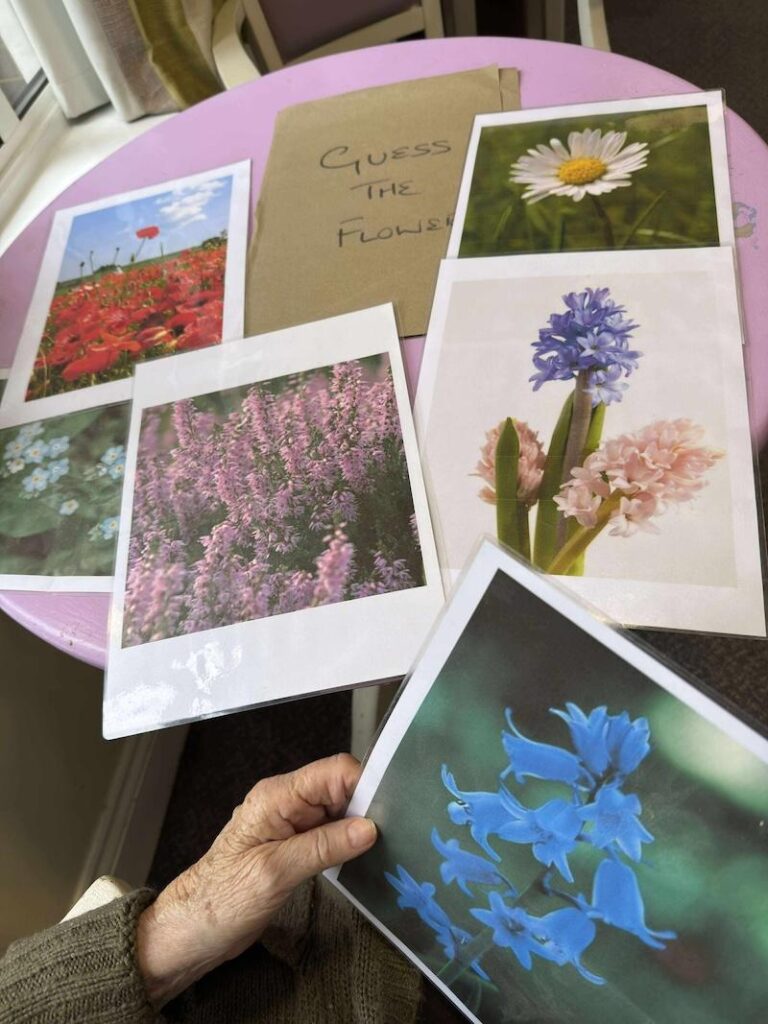 residents playing a 'guess the flower' game