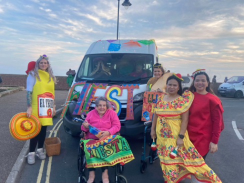 Staff and resident with the minibus ready for Seaton Carnival