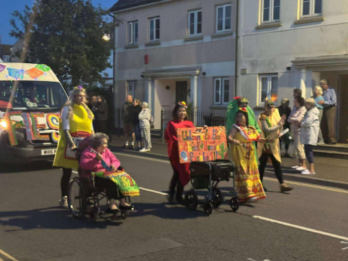 Staff and residents in the parade at Seaton Carnival
