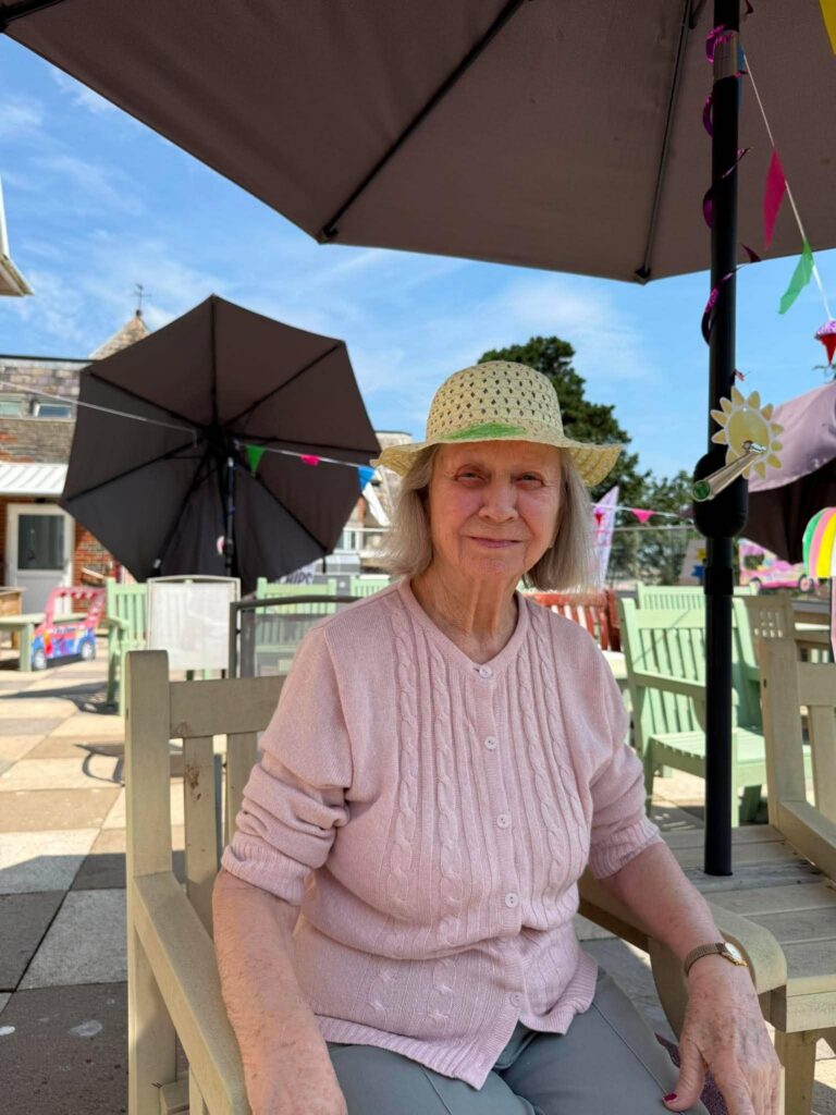 resident in the garden with a hat on it
